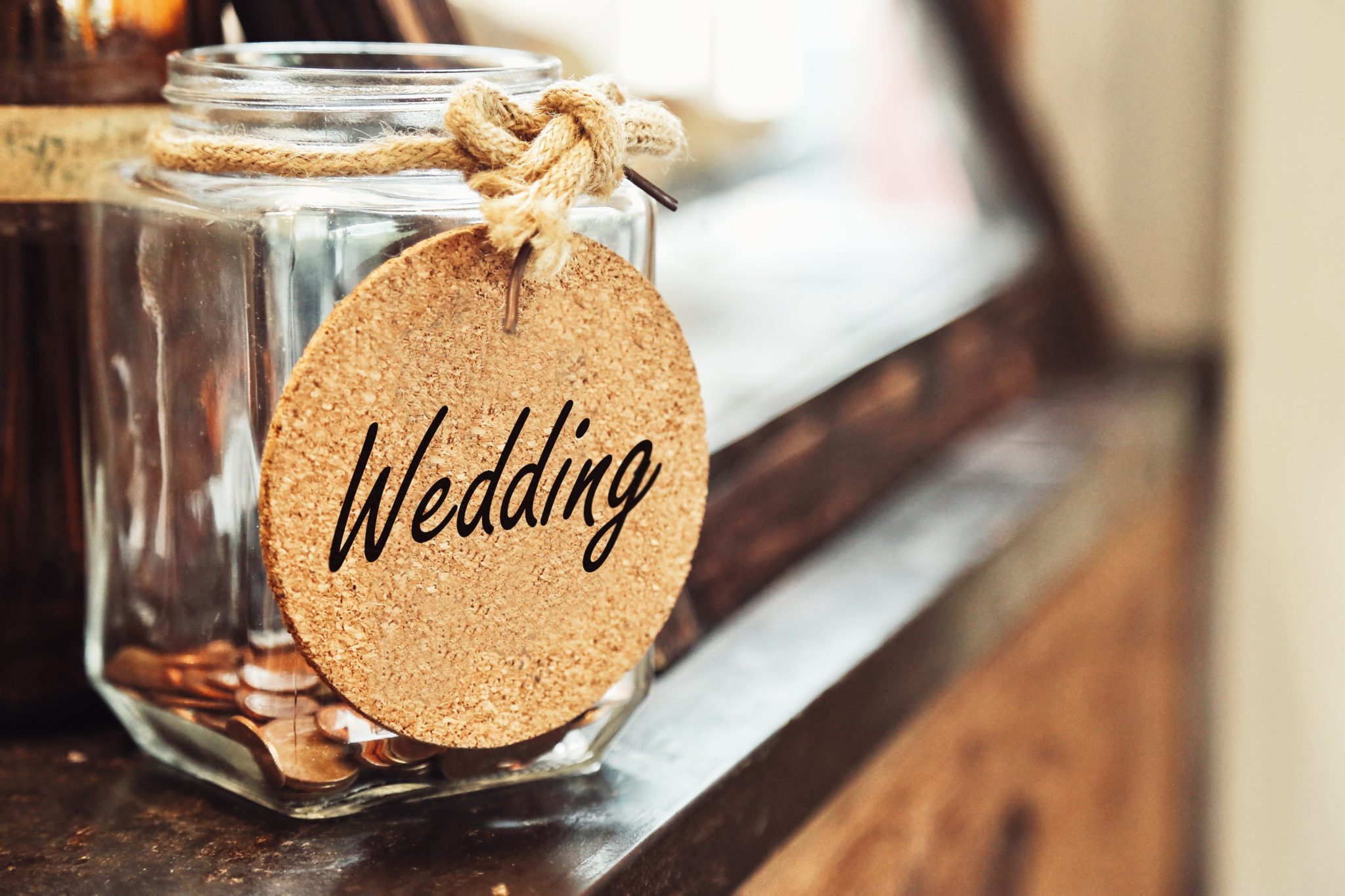 Vintage retro glass jar with hemp rope tie wedding tag and few c Vintage retro glass jar with hemp rope tie wedding tag and few c