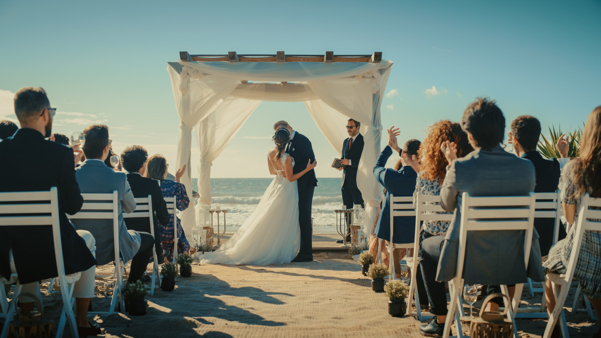 destination wedding couple first kiss