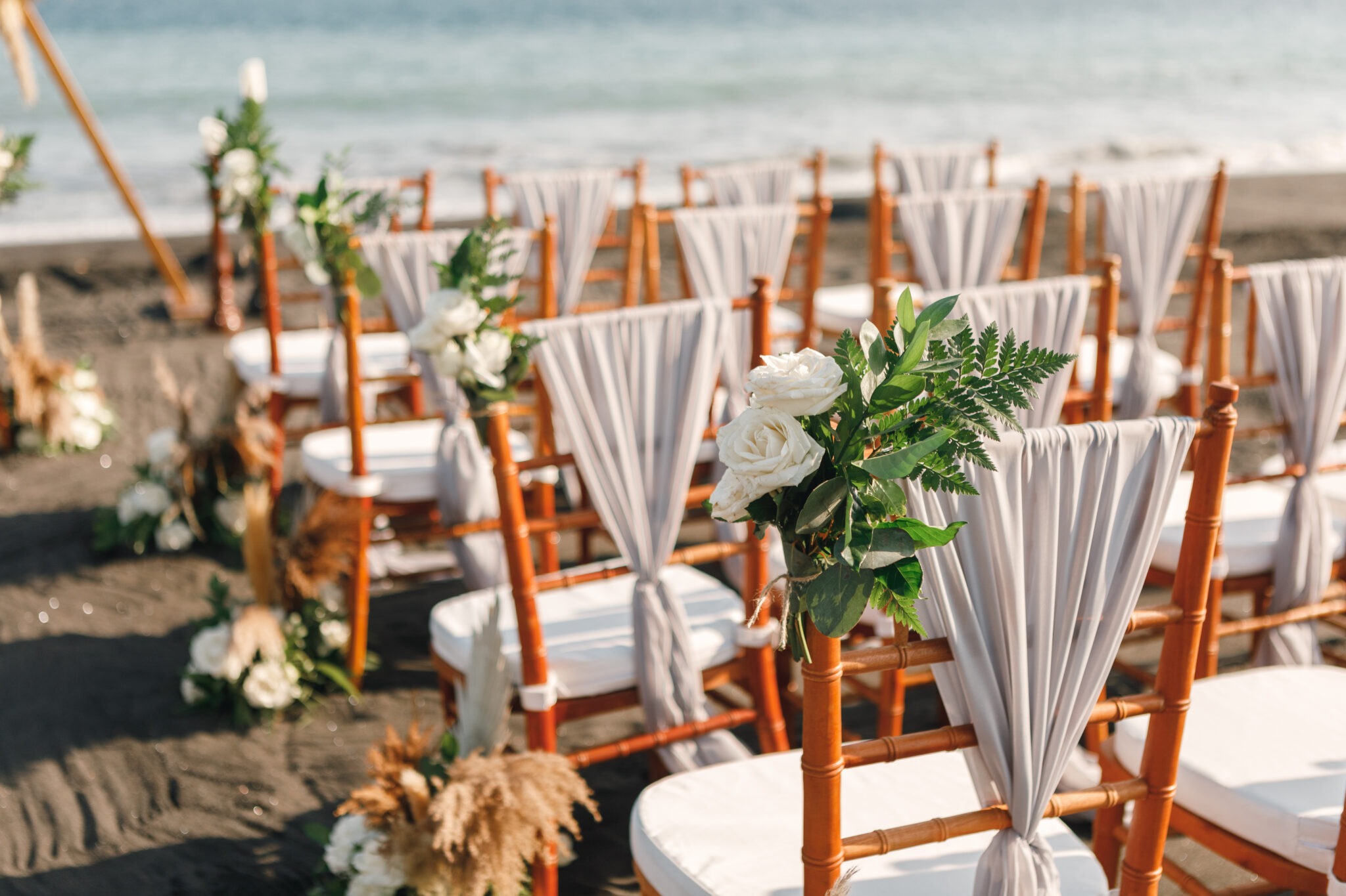 Wedding Set up. Chairs with flowers and greenery on wedding cer Wedding set up chairs with flowers