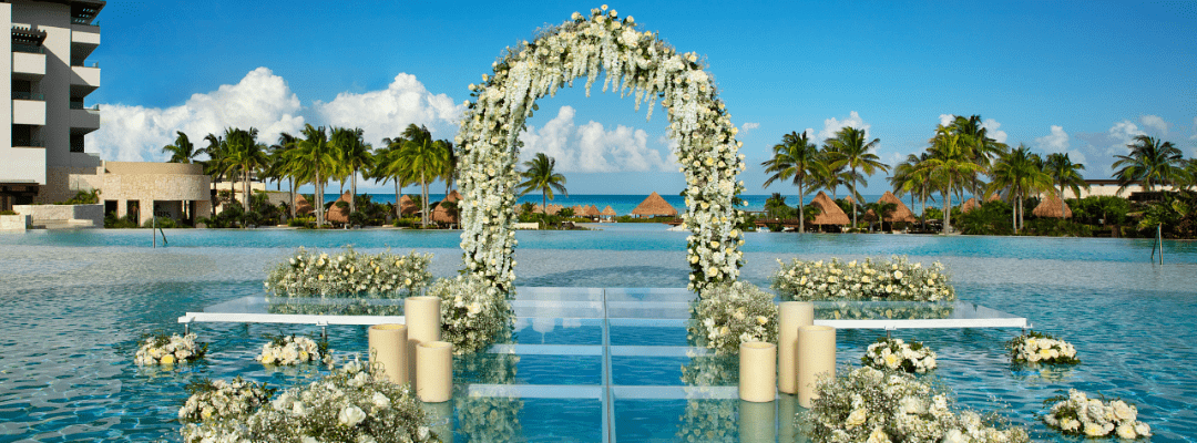 Dreams Playa Mujeres wedding ceremony setup over water