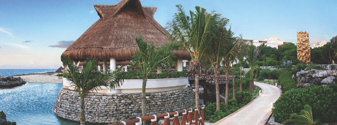 Hard Rock Hotel Riviera Maya wedding ceremony setup under a hut with ocean views
