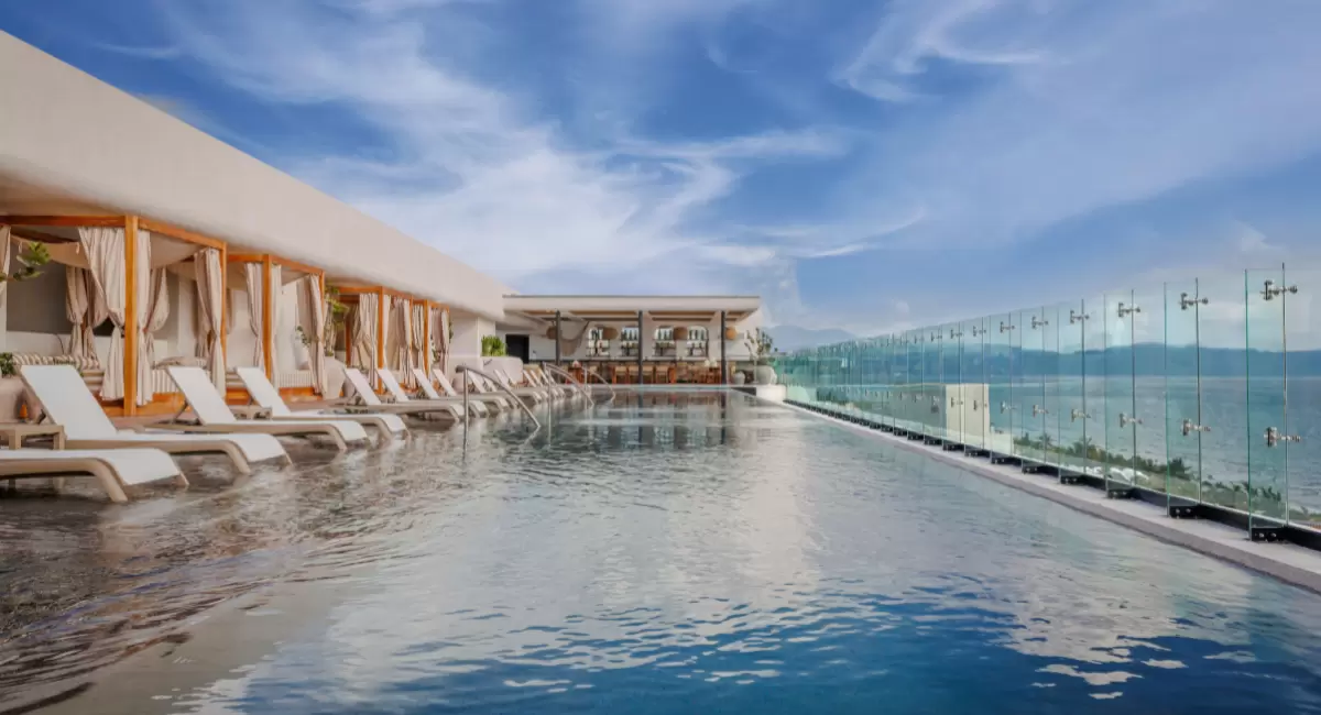 View of pool meeting ocean view at Unico Riviera Nayarit resort