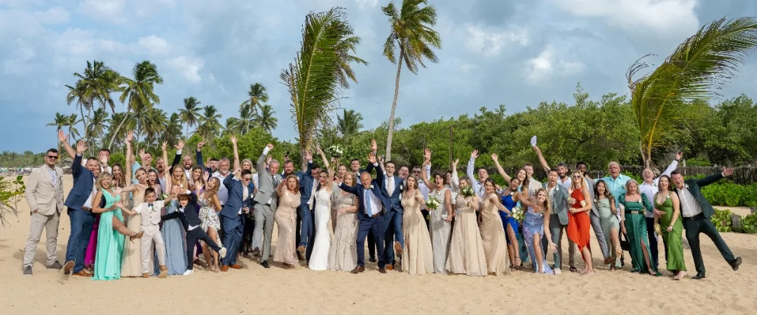 Destination wedding guests after booking their travel for a destination wedding