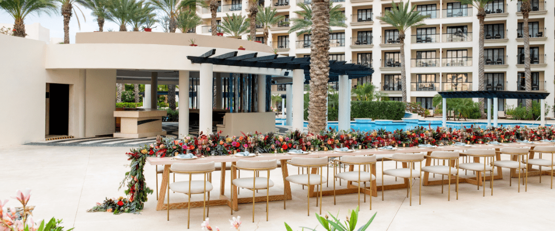 Destination wedding reception poolside resort tables